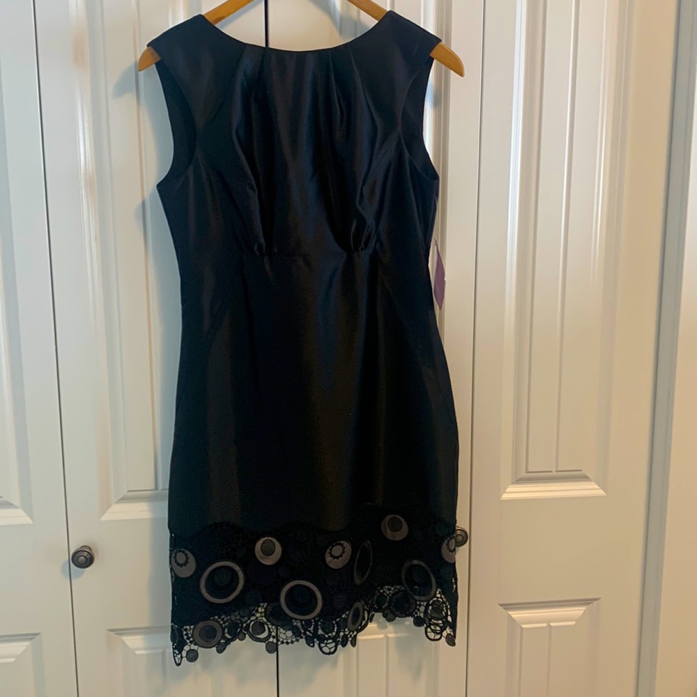 Lovely satin back dress with scalloped grey/taupe scallop detail. NWT
